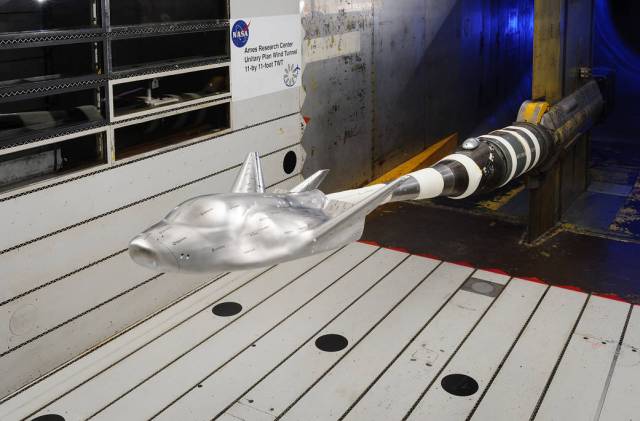 model of SNC Dream Chaser Lifting Body aircraft in wind tunnel