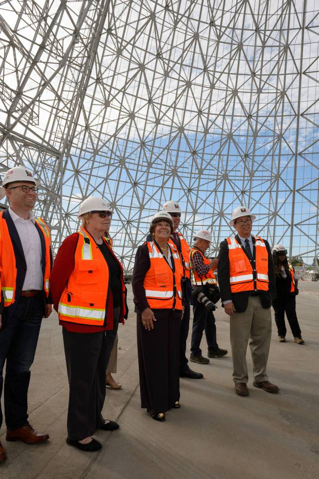 From left to right: Javier González, head of External Affairs in California at Google, Rep. Zoe Lofgren, Rep. Anna Eshoo, and Ames Center Director Eugene Tu tour the inside of Hangar One. 