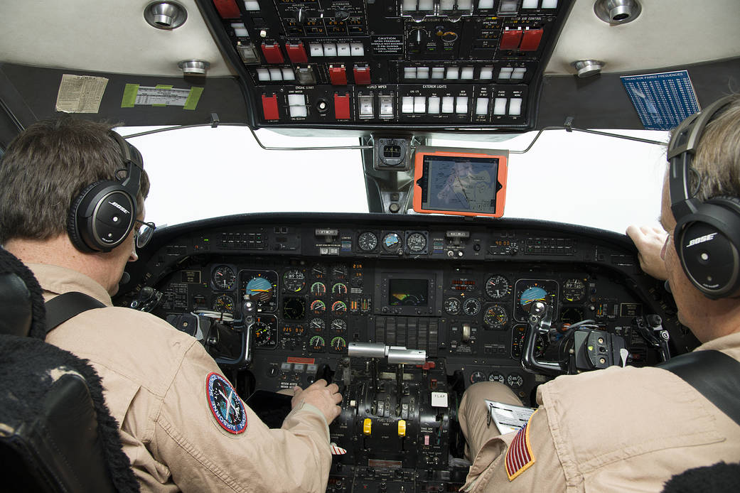 Armstrong Pilots David Fedors and Stu Broce are at the controls of the C-20A in March 2016.
