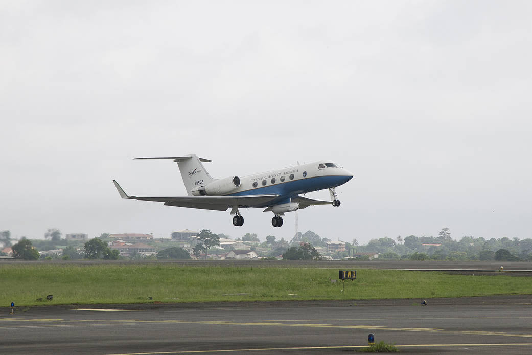 The C-20A aircraft takes off from airport runway.