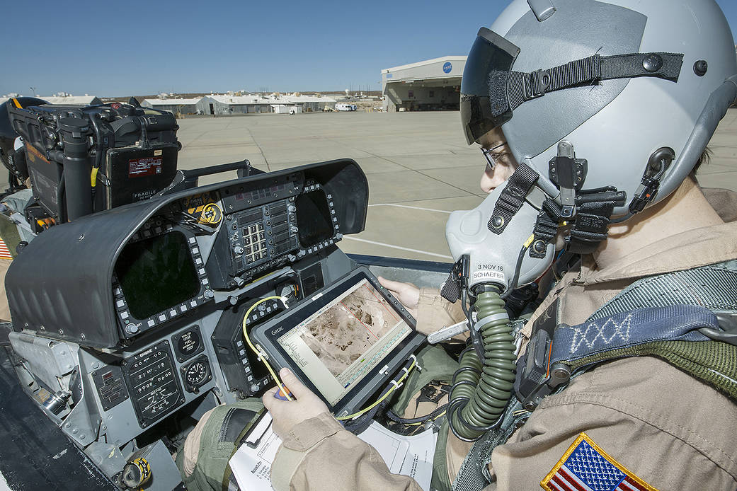 Flight Test Engineer Jacob Schaefer inspects the CISBoomDA.
