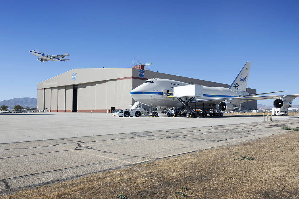 Pratt and Whitney Canada’s 747SP testbed departs NASA Armstrong Flight Research Center Building 703 in Palmdale, California.