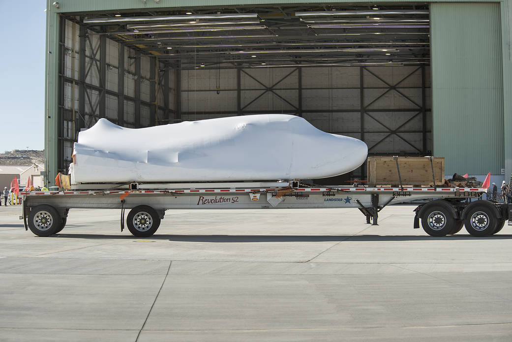 The Dream Chaser space vehicle heads to the hangar, where it will be housed for several months of testing. 