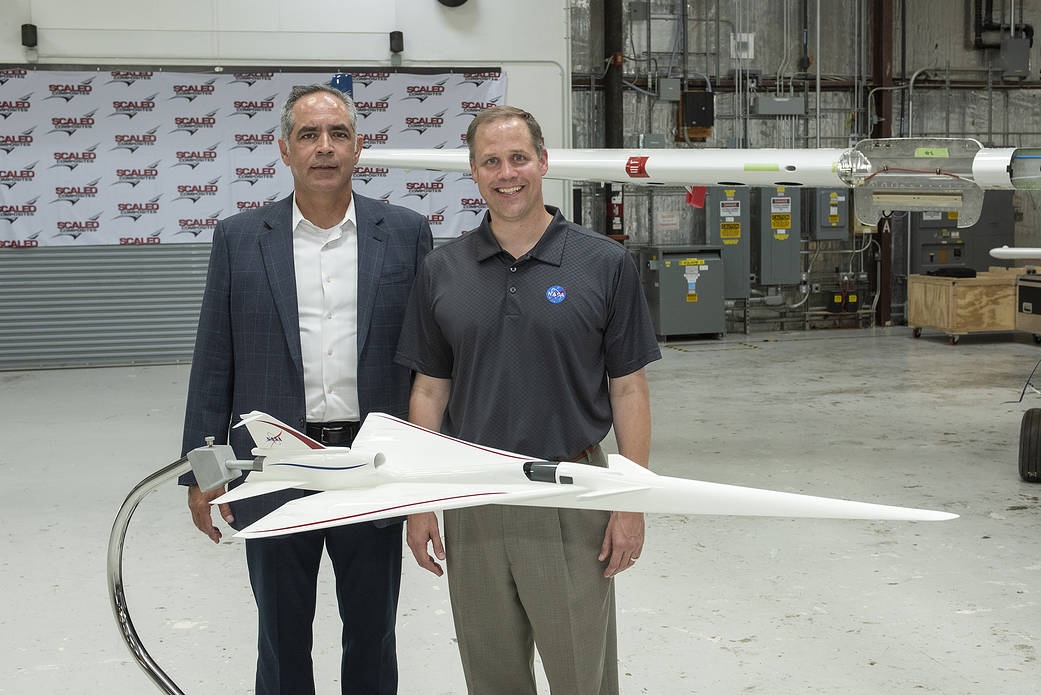 NASA Administrator Bridenstine stands with AFRC center director McBride by model NASA’s Supersonic X-Plane.