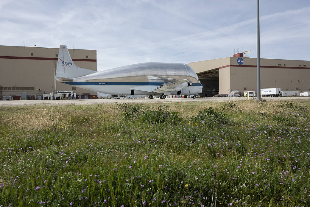 NASA’s Super Guppy cargo transport aircraft parked on the ramp in front of NASA AFRC's Building 703.