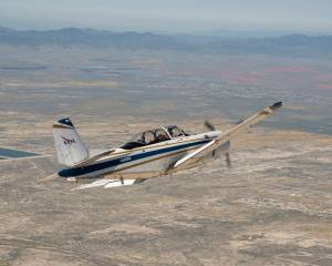 NASA’s T-34 aircraft heading toward Southern California’s Antelope Valley Poppy Reserve.