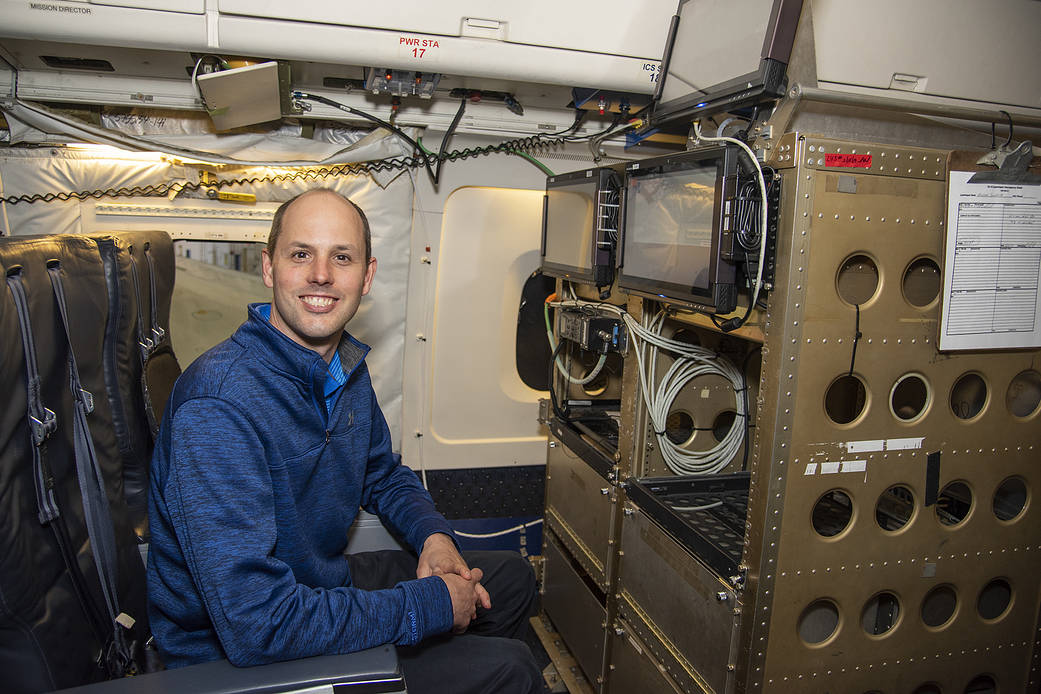 NASA Langley Research Center's Kris Bedka on the DC-8 flying laboratory during the Aeoulus mission.