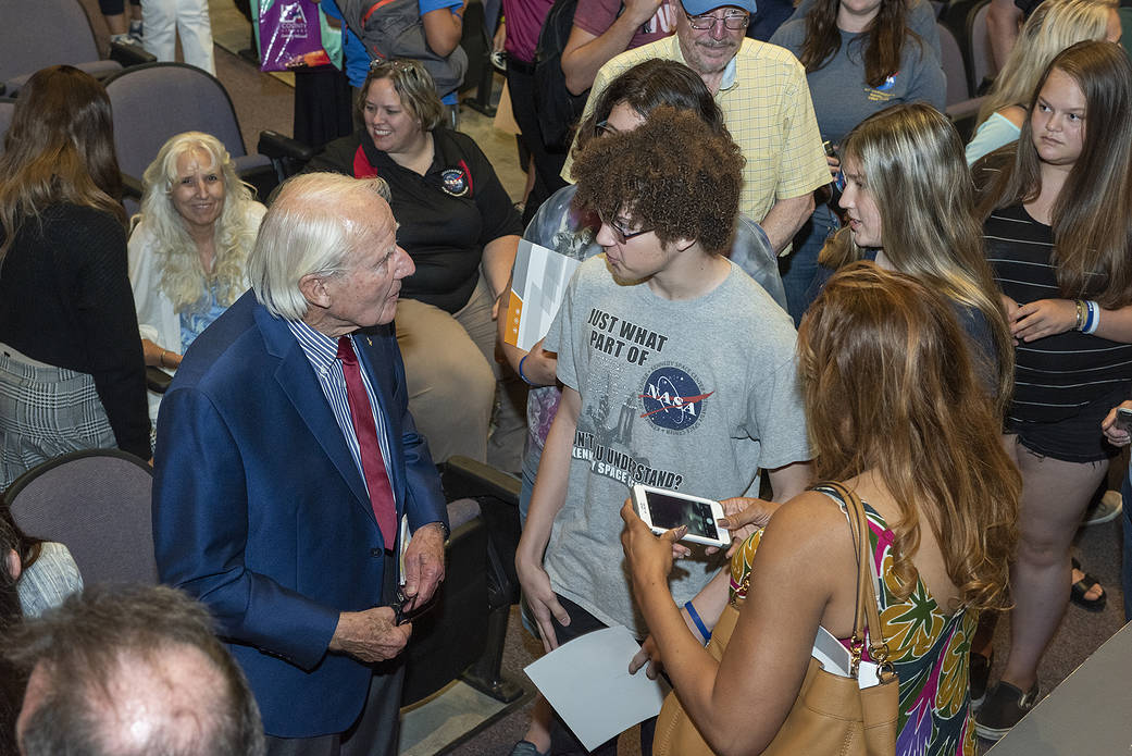 Apollo-Soyuz Astronaut Vance Brand speaks to attendees at a celebration of the Apollo 50th Anniversary.