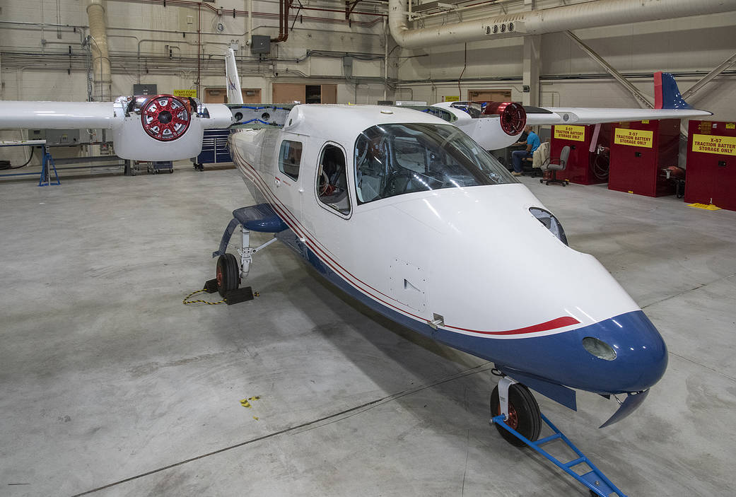 The X-57 Mod II wing is rejoined with the aircraft’s fuselage.