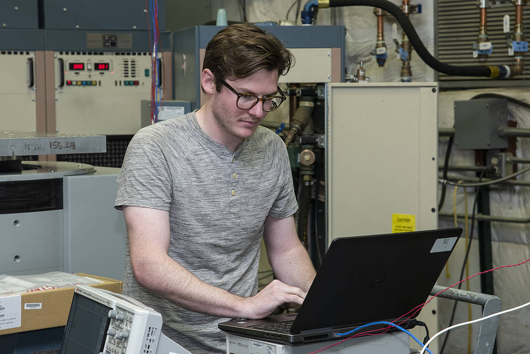 Engineers from NASA’s Armstrong Flight Research Center and Empirical Systems Aerospace prepare a cruise motor controller.