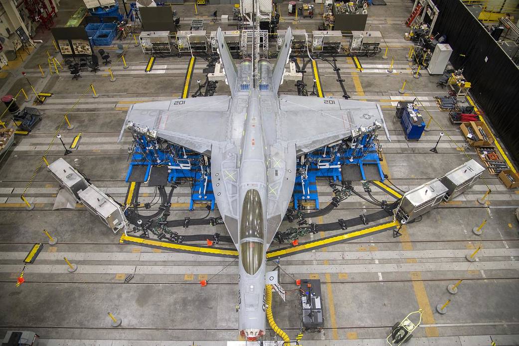 airplane being tested inside a hangar