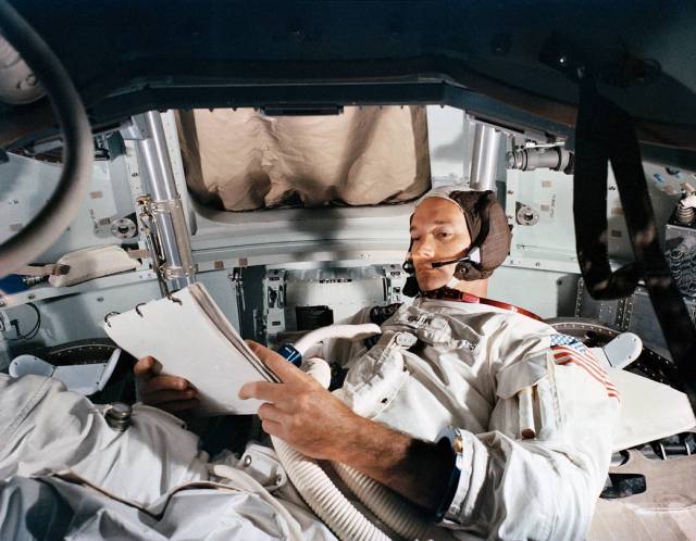Michael Collins in the Command Module simulator at Kennedy Space Center in 1969