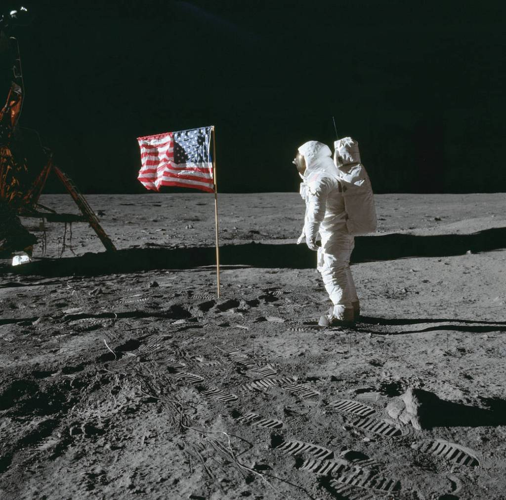 Buzz Aldrin salutes the flag