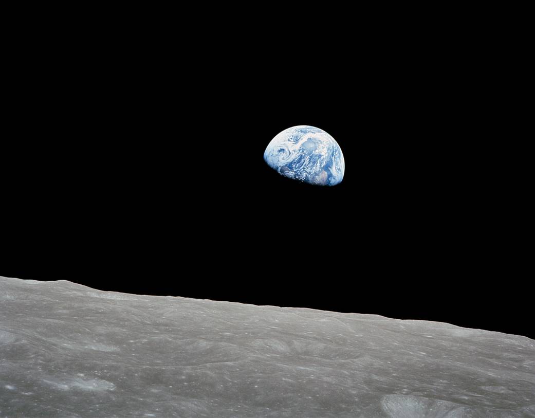 Apollo 8's Earthrise photo with the earth appearing over the horizon of the Moon