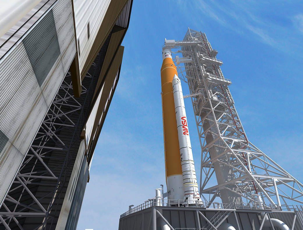 The NASA logotype, or "worm" logo, is seen on a booster on the side of NASA's Space Launch System.