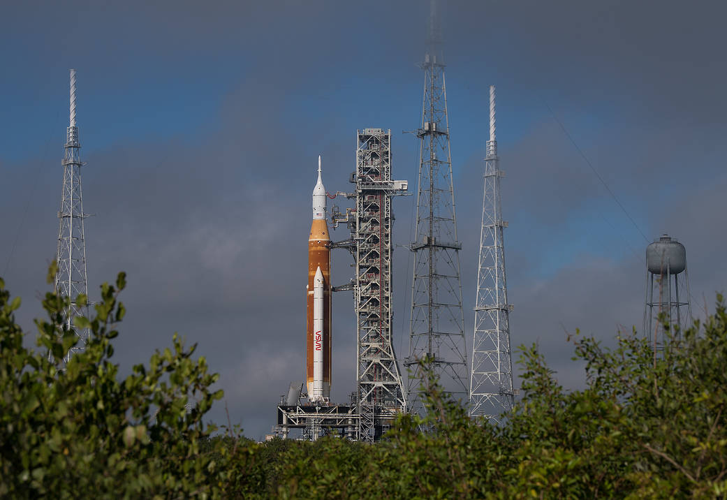 NASA’s Space Launch System (SLS) rocket with the Orion spacecraft aboard is seen atop a mobile launcher at Launch Complex 39B, Friday, March 18, 2022, after being rolled out to the launch pad for the first time at NASA’s Kennedy Space Center in Florida. 