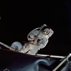 Astronaut Russell L. Schweickart performs a spacewalk on the fourth day of the Earth-orbital Apollo 9 mission.