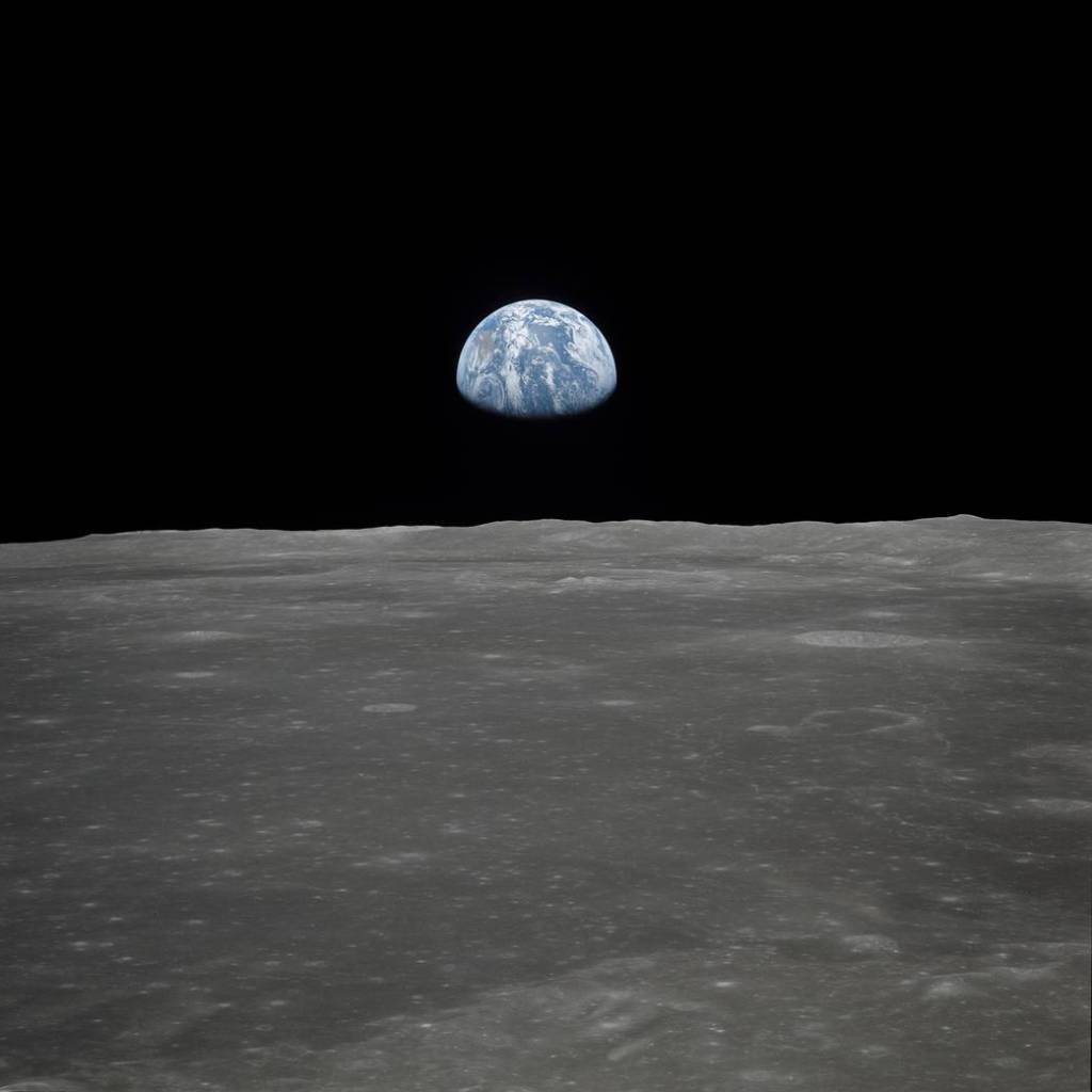 Earth Rising over the Moon’s Horizon