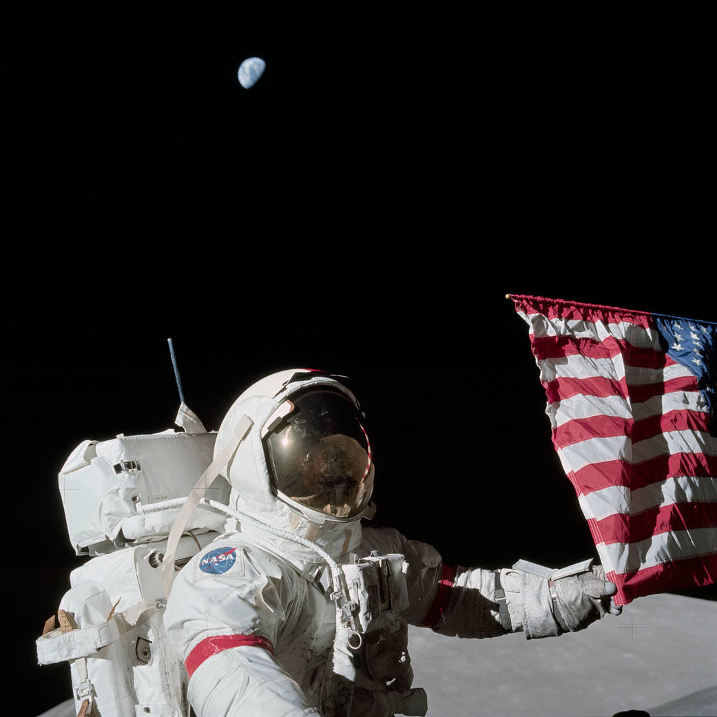 Apollo 17 Commander Eugene Cernan and the U.S. flag on the lunar surface.