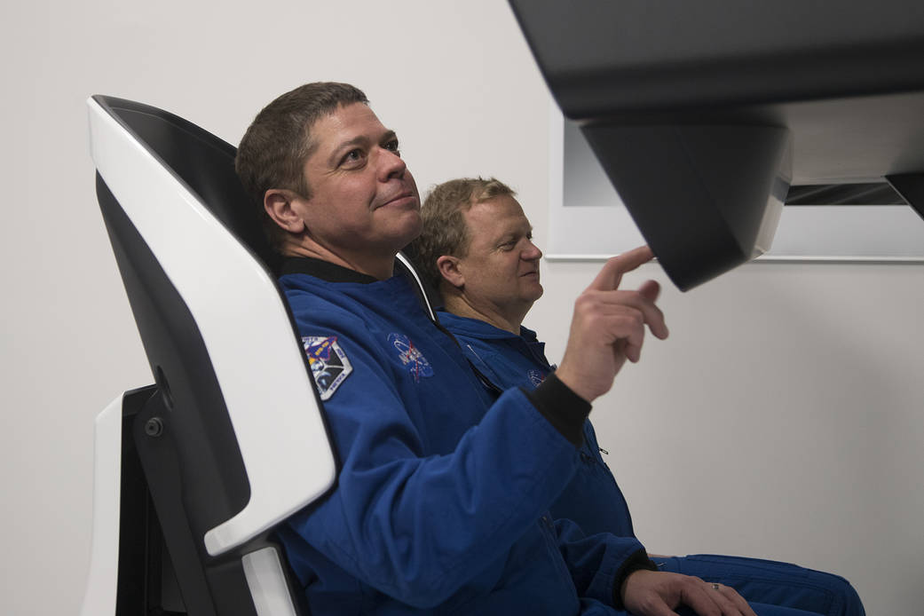 Astronauts Bob Behnken and Eric Boe evaluate Crew Dragon