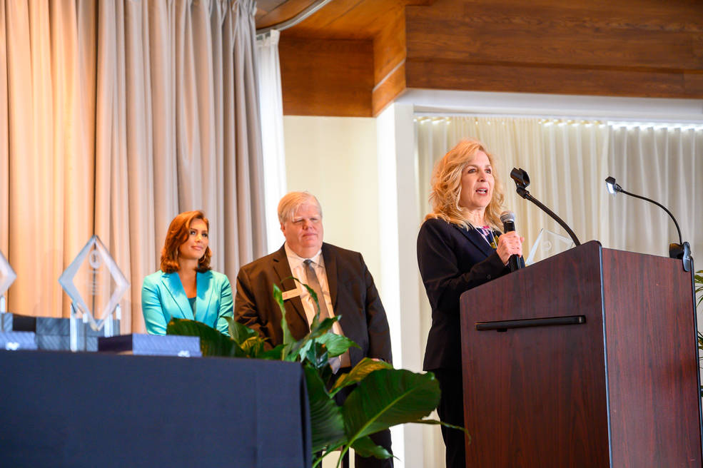 Sharon Cobb, right, associate program manager of NASA’s Space Launch System (SLS) Program, accepts the Project of the Year award from Business Alabama at a luncheon in Birmingham on March 3.