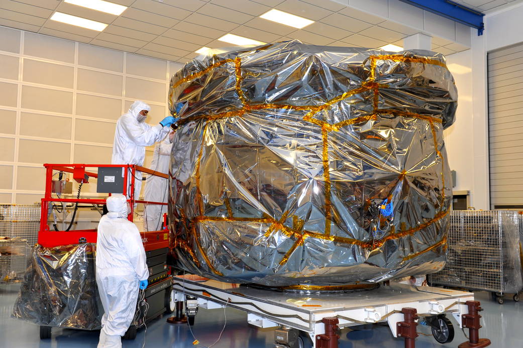 MMS engineers complete the bagging of MMS observatories #1 and #2 for shipment to Florida.