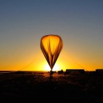 Inflated Balloon in front of sunset.