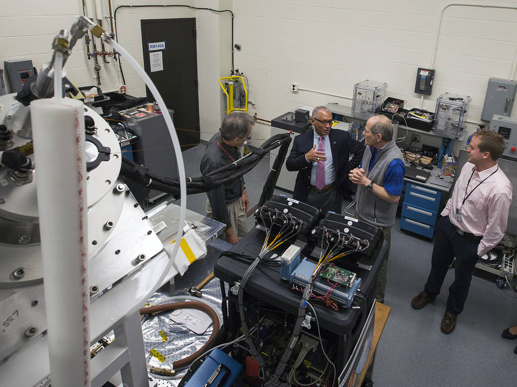 NASA Administrator Charles Bolden talks with researchers about the CLARREO climate change mission.