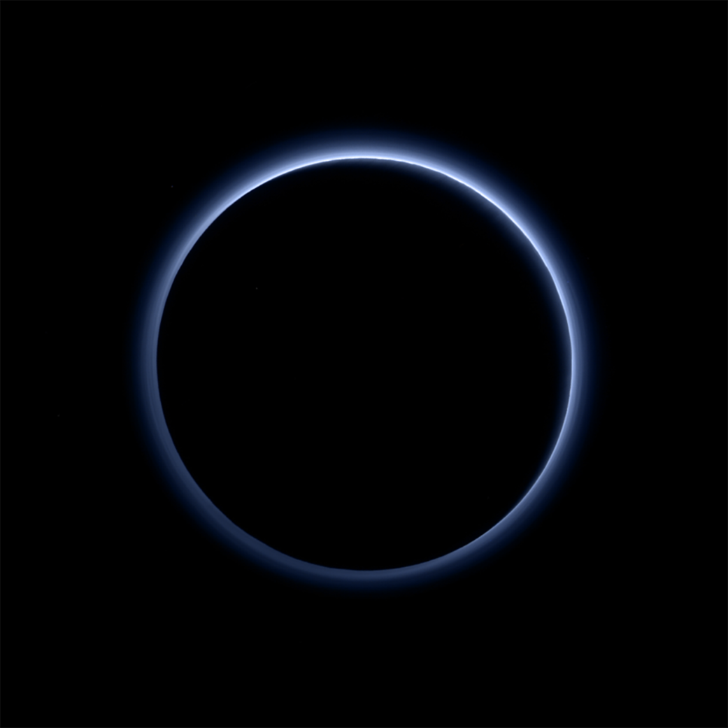 Blue haze around Pluto.