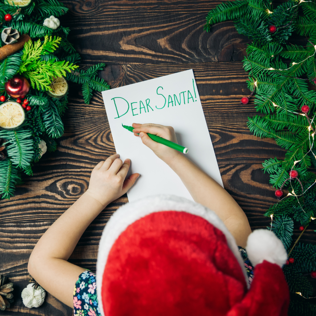a child writing a letter to Santa Claus