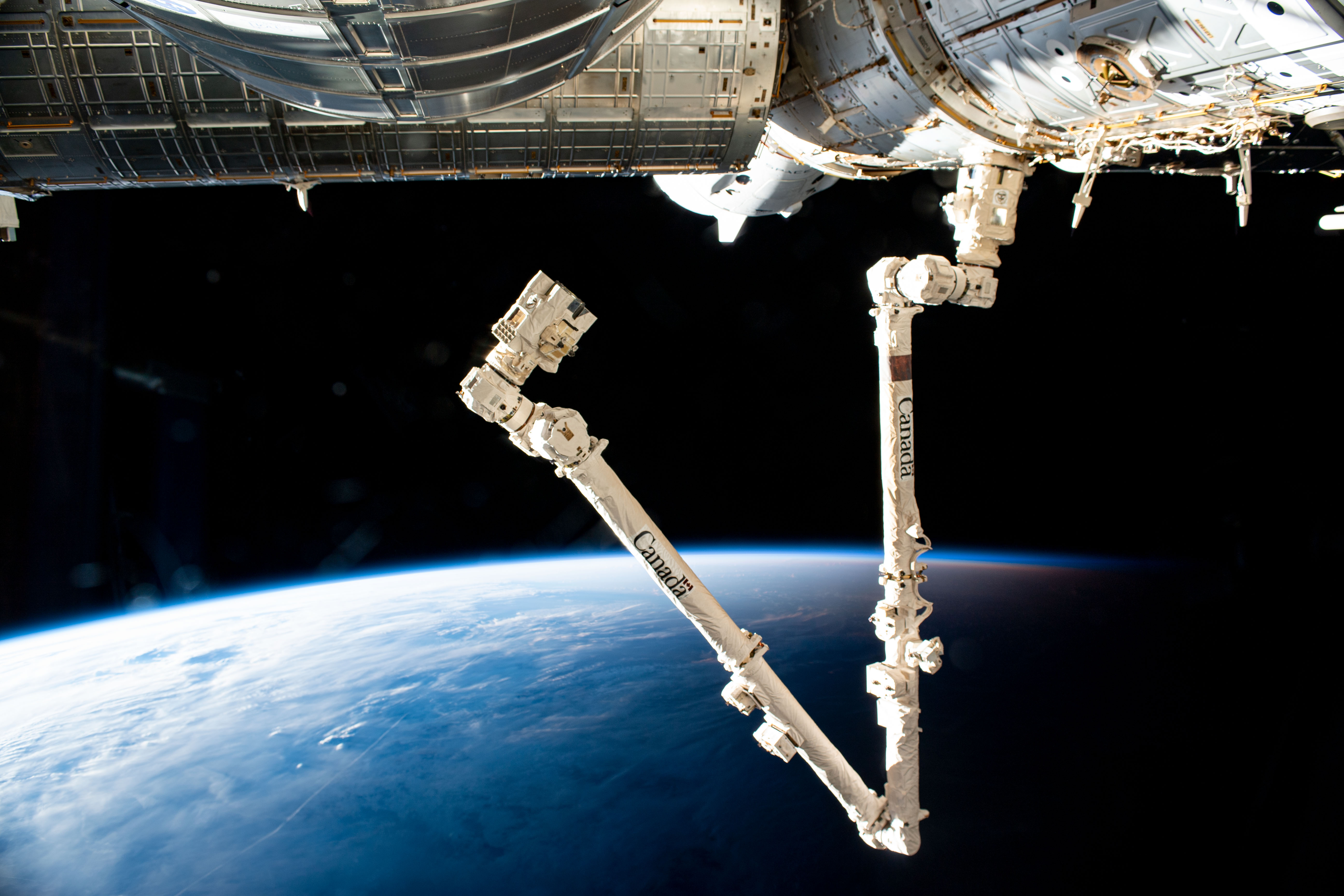 The Canadarm2 robotic arm, from the Canadian Space Agency, is pictured attached to the International Space Station.