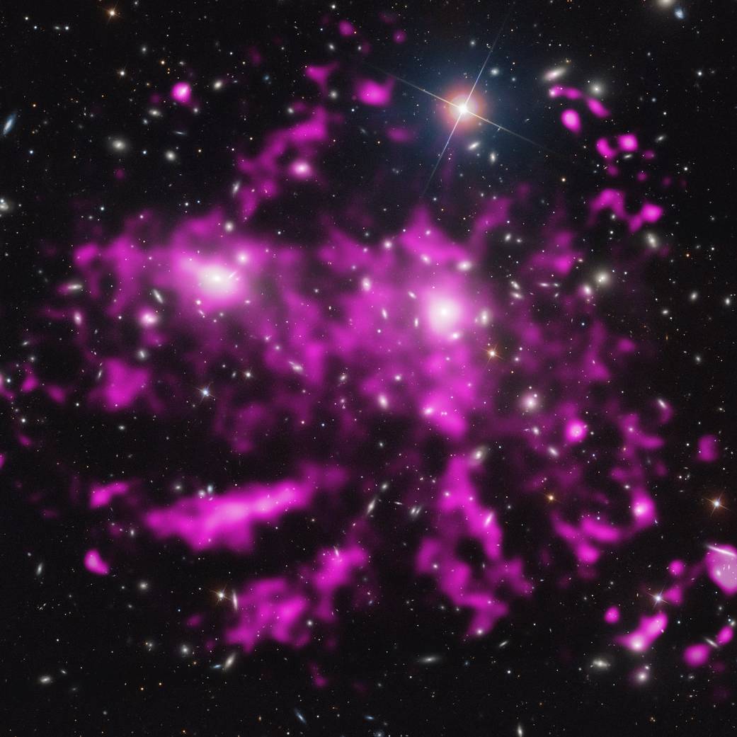 Composite image shows the spectacular hot gas arms of the Coma cluster of galaxies.