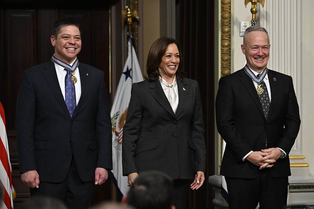 Former NASA astronauts Robert Behnken, left, and Douglas Hurley, right, after being awarded the Congressional Space Medal of Honor by Vice President Kamala Harris during a ceremony on Tuesday, Jan. 31, 2023 in Washington. 