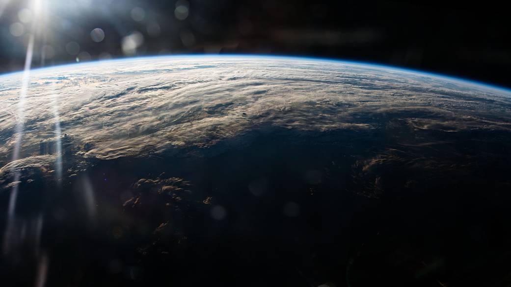 View of sunrise over Earth's horizon taken from low Earth orbit