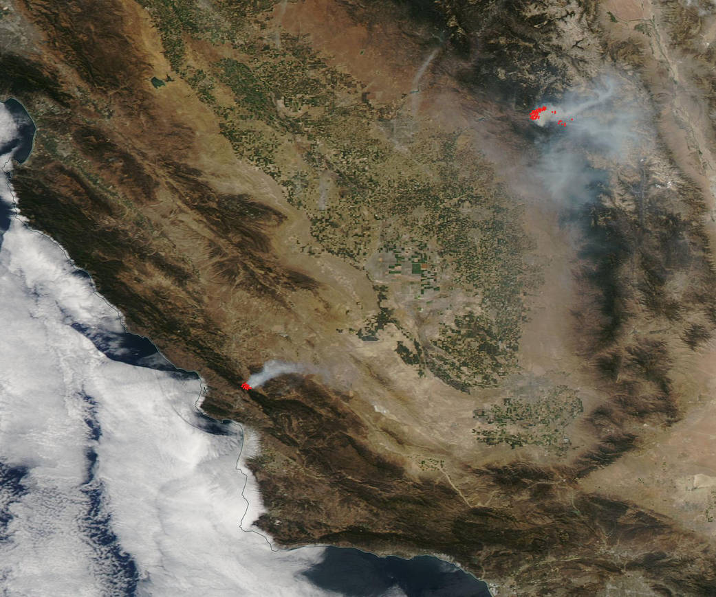 Smoke from southern California's Cuesta Fire near San Luis Obsipo and the Rough Fire, five miles orth of Hume Lake. 