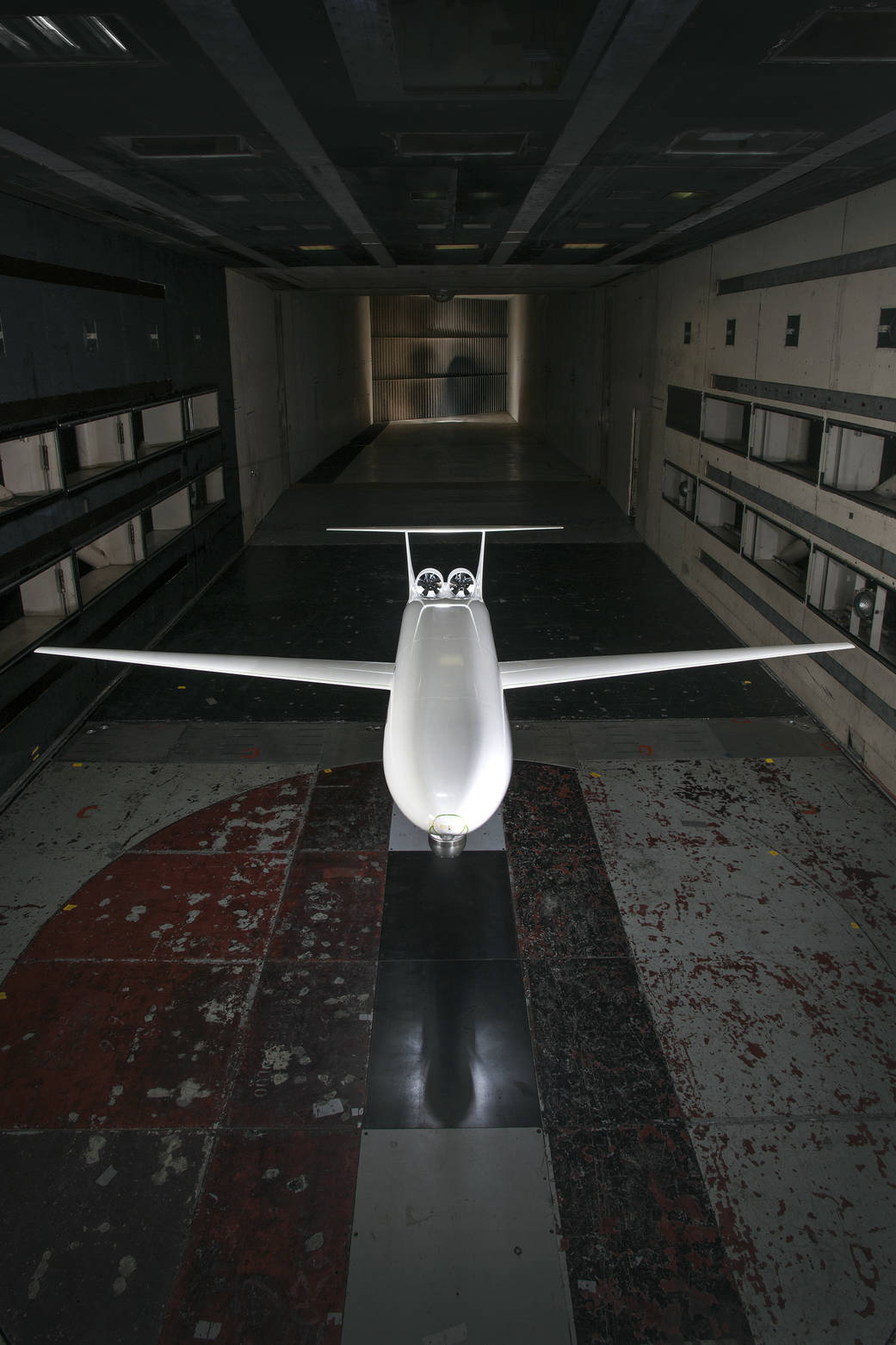 This scale model of a potential future aircraft concept sits inside the 14 by 22-Foot Subsonic Wind Tunnel at NASA Langley.