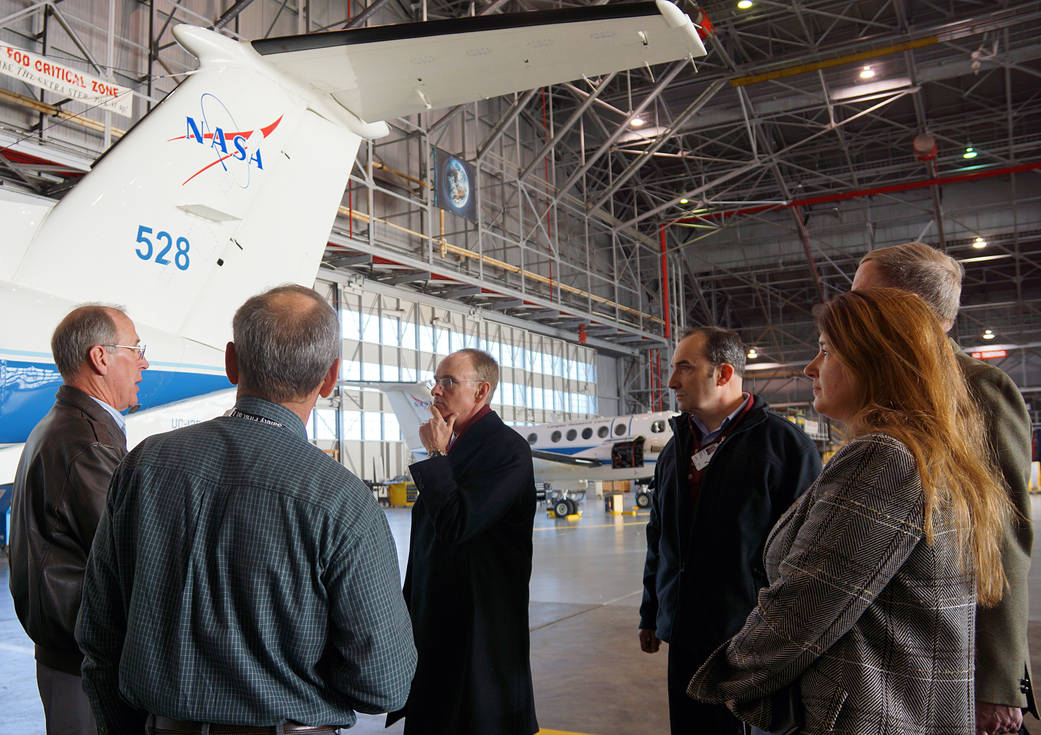 DARPA Aircrew Labor In-Cockpit Automation System consultants Mark Nowack and Joe Edwards visit the NASA Langley hangar.