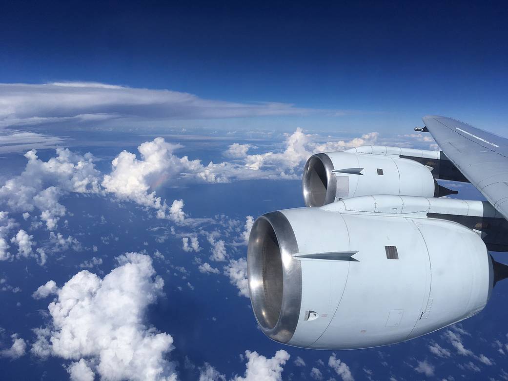 DC-8 flying over convective clouds in the Caribbean Sea.