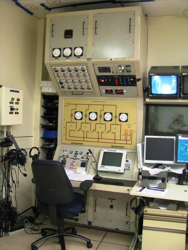 Detail view of the Power Operator Panel within the Control Room of ARMSEF
