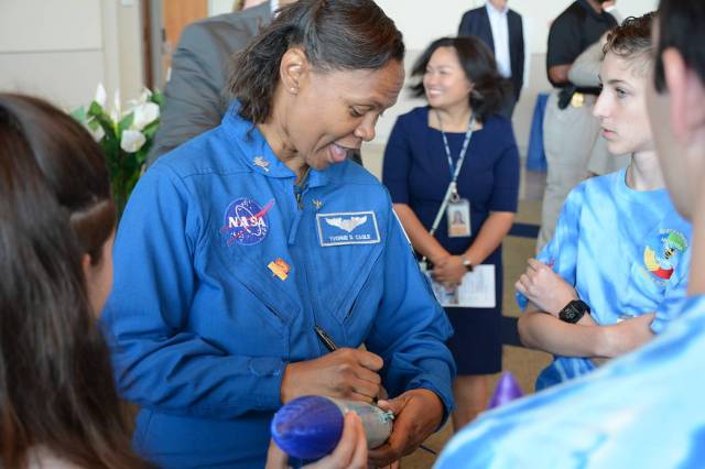 NASA Astronaut Yvonne Cagle Signs Rocket