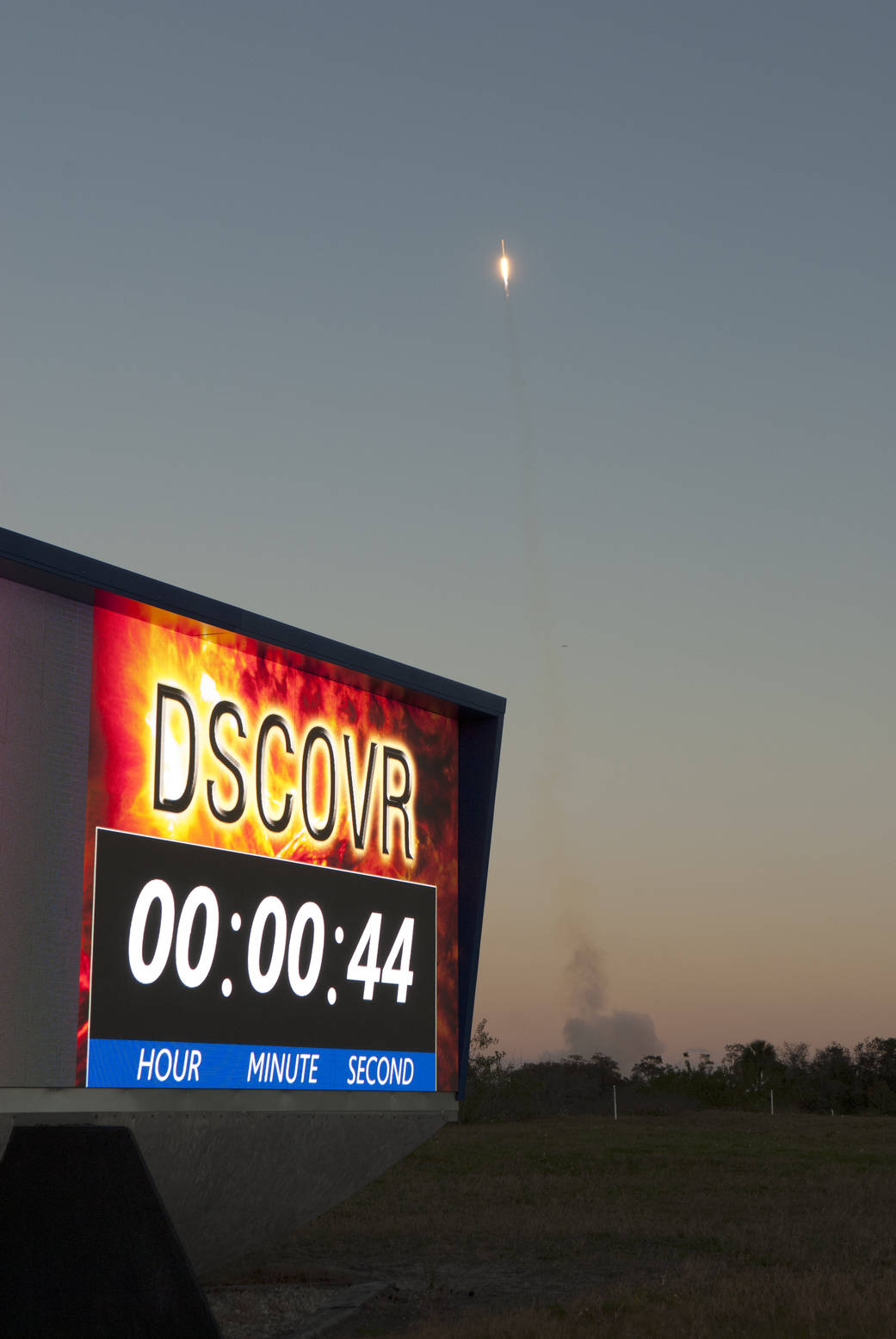 launch of DSCOVR, with countdown clock (reading 44 seconds after liftoff) in foreground