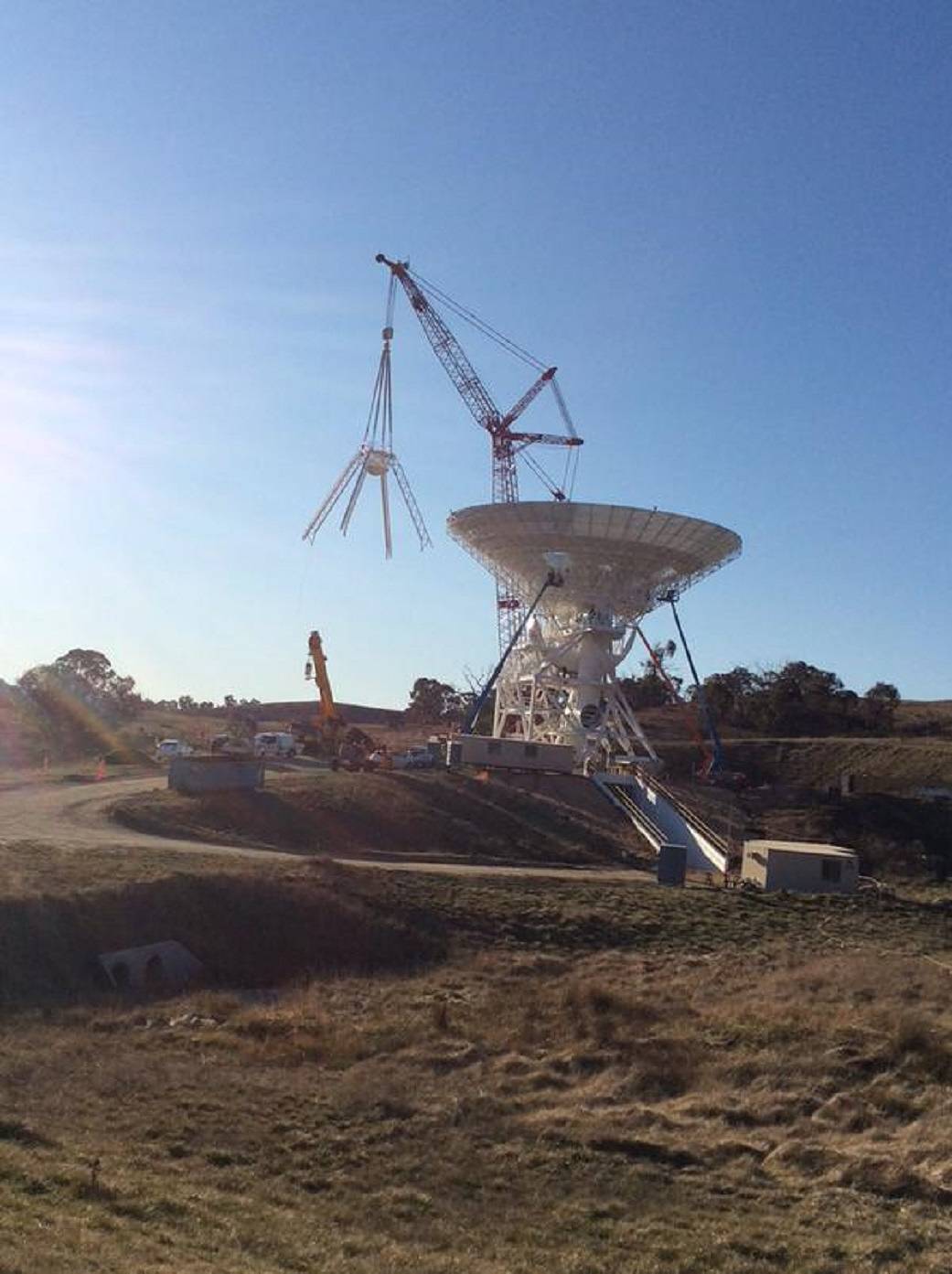 The Quadripod Being Lifted Atop the Reflector
