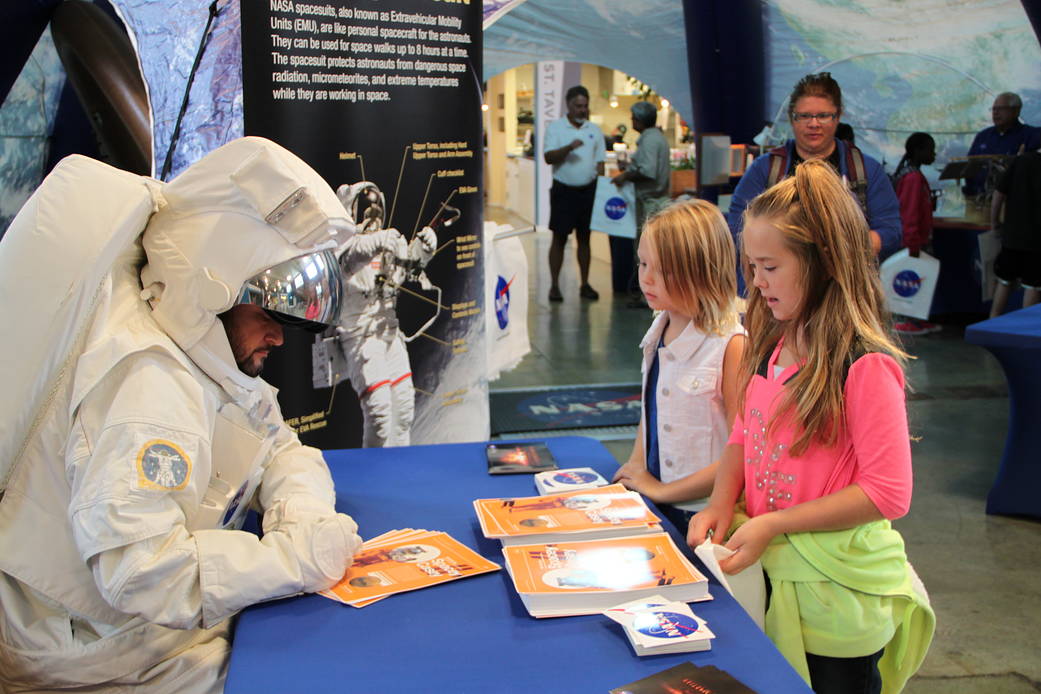 NASA Langley Public Relations Specialist Dustin Hitt teaches young people about living and working in space in his role as Space