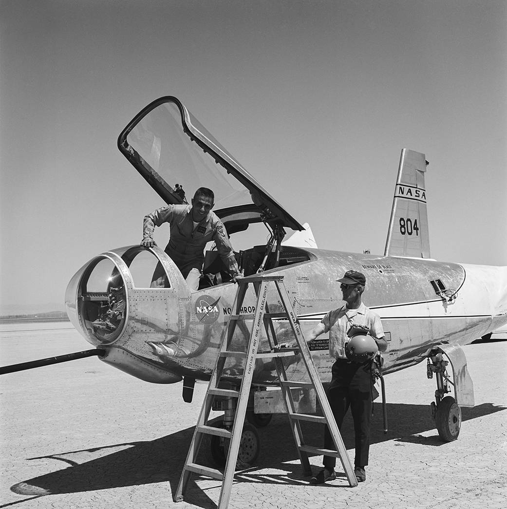 Armstrong research pilot (and future center director) John Manke emerges from the HL-10 aircraft.