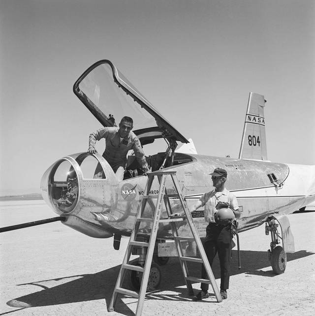 Armstrong research pilot (and future center director) John Manke emerges from the HL-10 aircraft.