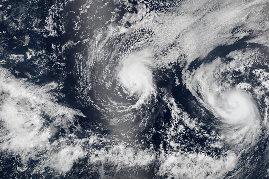Composite image of three Suomi-NPP satellite passes over the tropical Pacific Ocean in the early afternoon of August 5, 2014, sh
