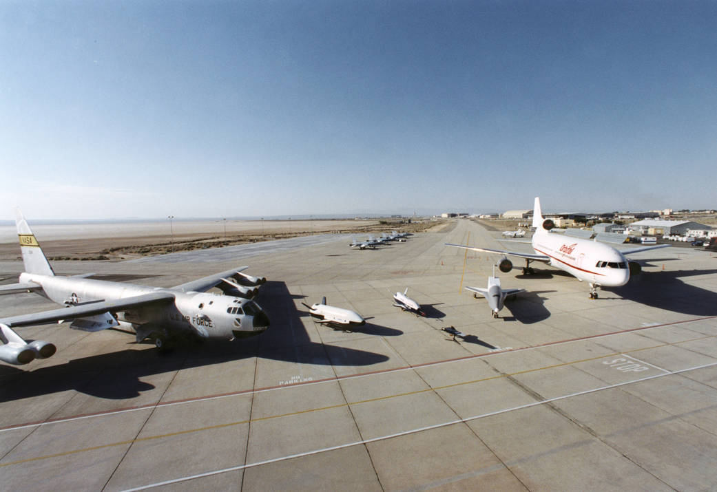 Aerospace industry representatives view actual and mock-up versions of 'X-Planes' during a technical exposition on June 22, 2000