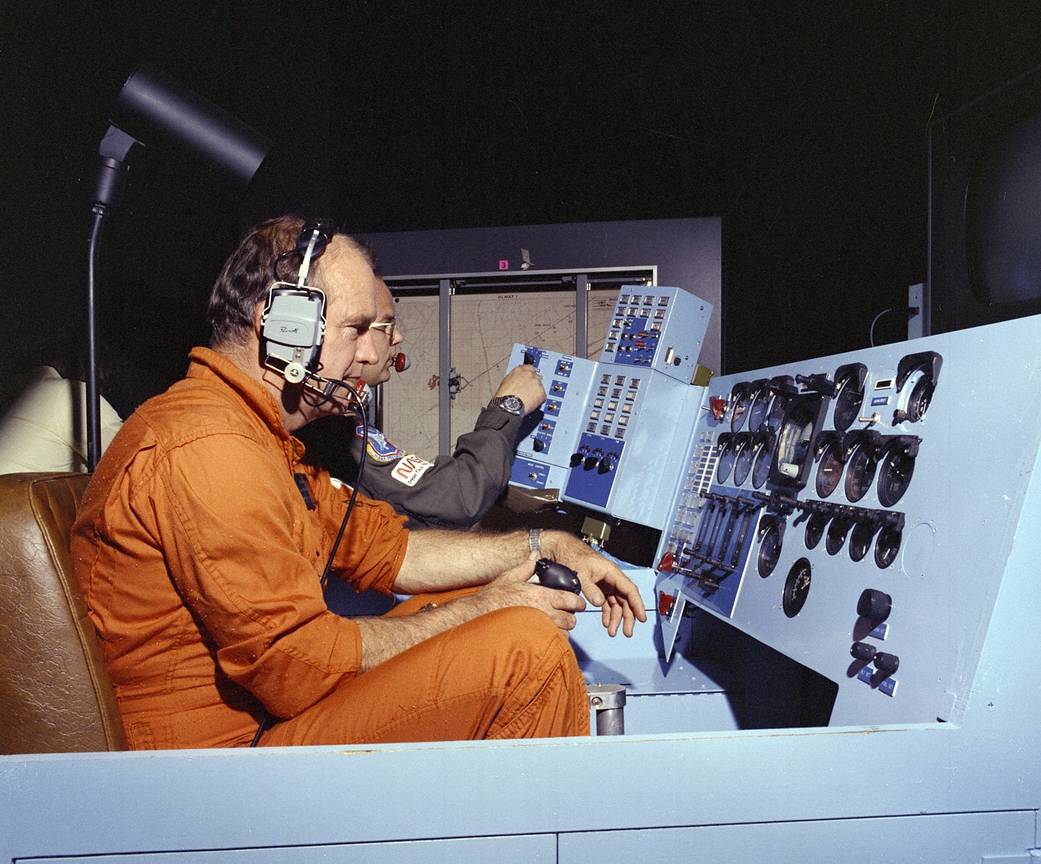 The late NASA research test pilot Bill Dana controls the remotely operated HiMAT sub-scale research aircraft from a ground contr