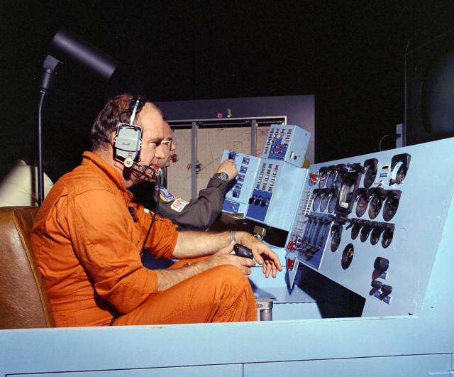 The late NASA research test pilot Bill Dana controls the remotely operated HiMAT sub-scale research aircraft from a ground contr