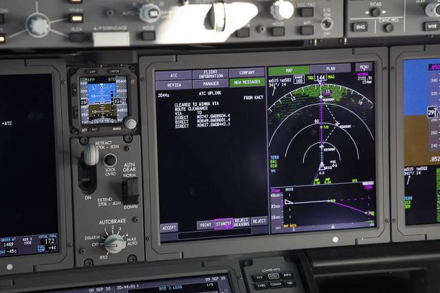 Close up view of a cockpit display screen shows NASA’s Tailored Arrival Manager (TAM) air traffic management tool.